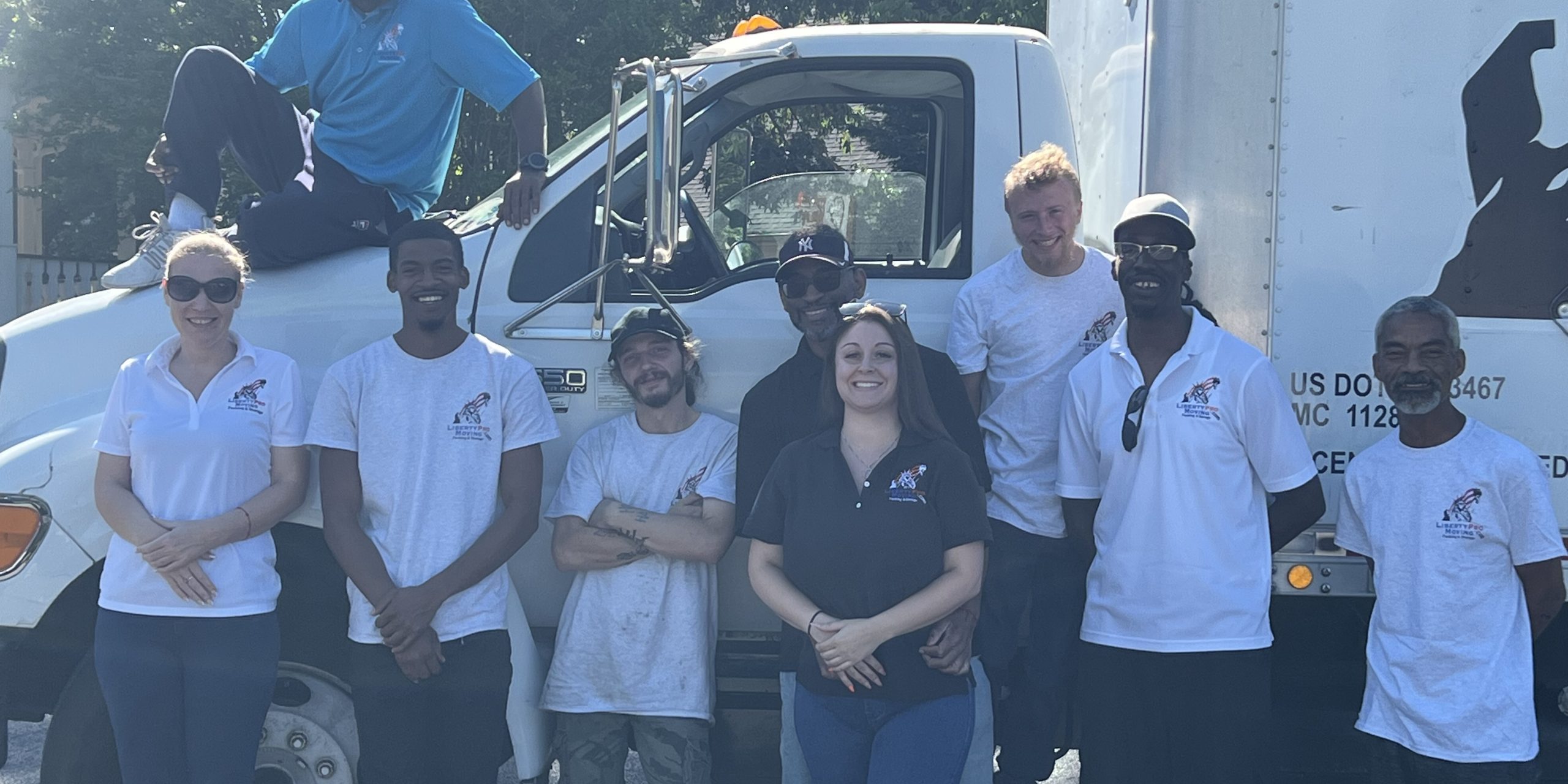 Professional movers wrapping furniture during Loganville Georgia move
