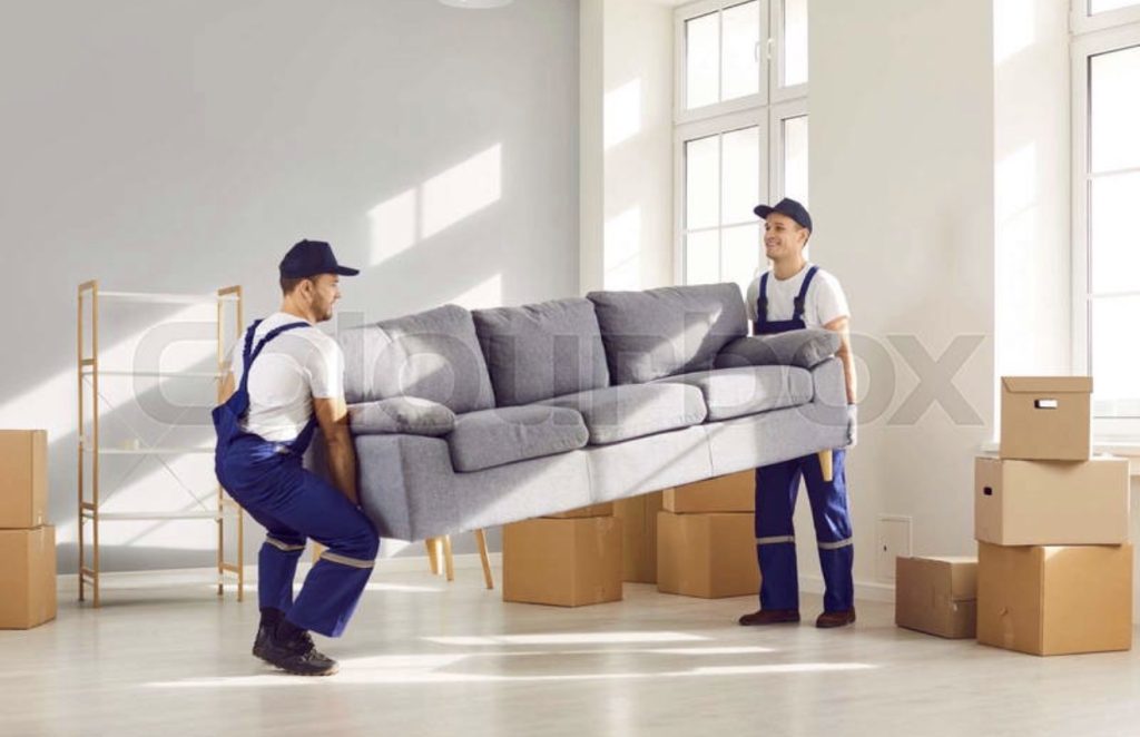 Professional moving crew loading Liberty Pro Moving truck in Norcross GA