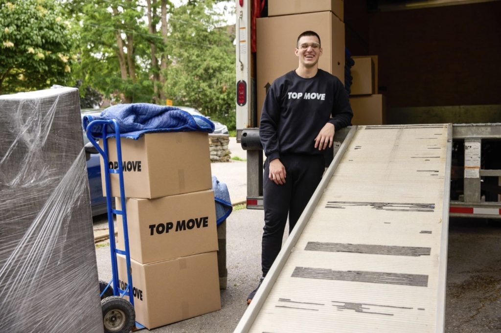 Liberty Pro Moving team performing stair carry during Loganville move | Lawrenceville Moving Company | LIBERTY PRO MOVING Liberty Pro Moving team performing stair carry during Loganville move
