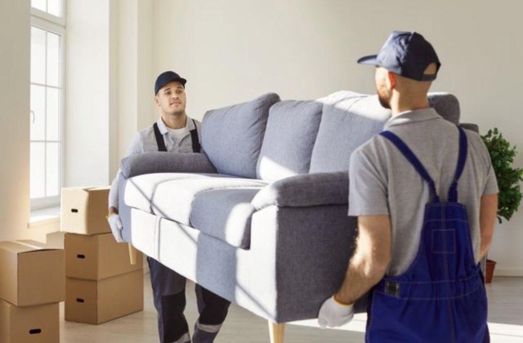 Liberty Pro Moving team performing stair carry during Loganville move | Lawrenceville Moving Company | LIBERTY PRO MOVING Liberty Pro Moving team performing stair carry during Loganville move