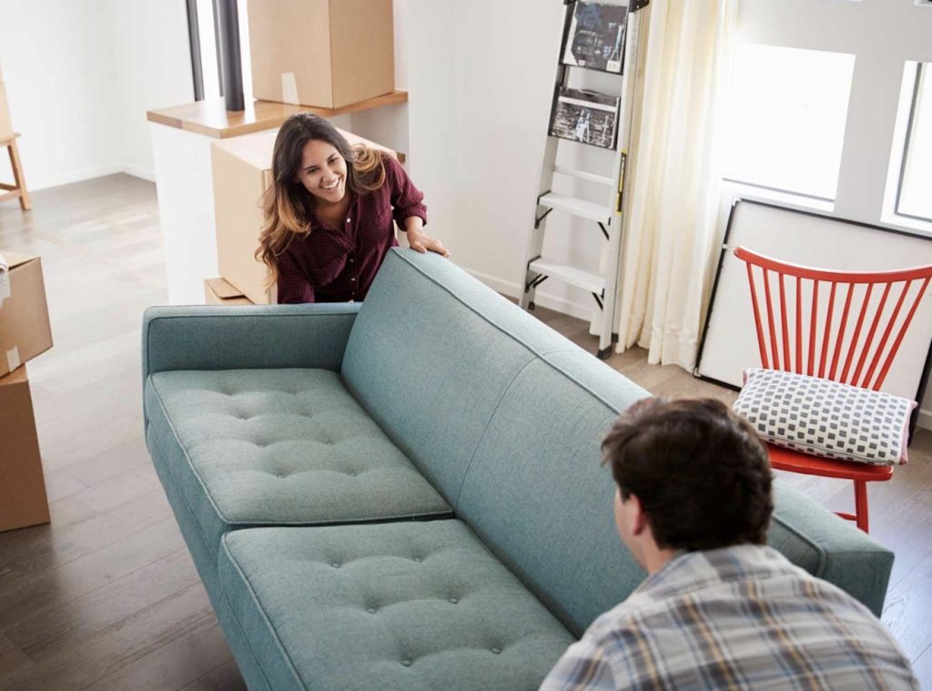 Movers navigating apartment hallway | Lawrenceville Moving Company | LIBERTY PRO MOVING Movers navigating apartment hallway