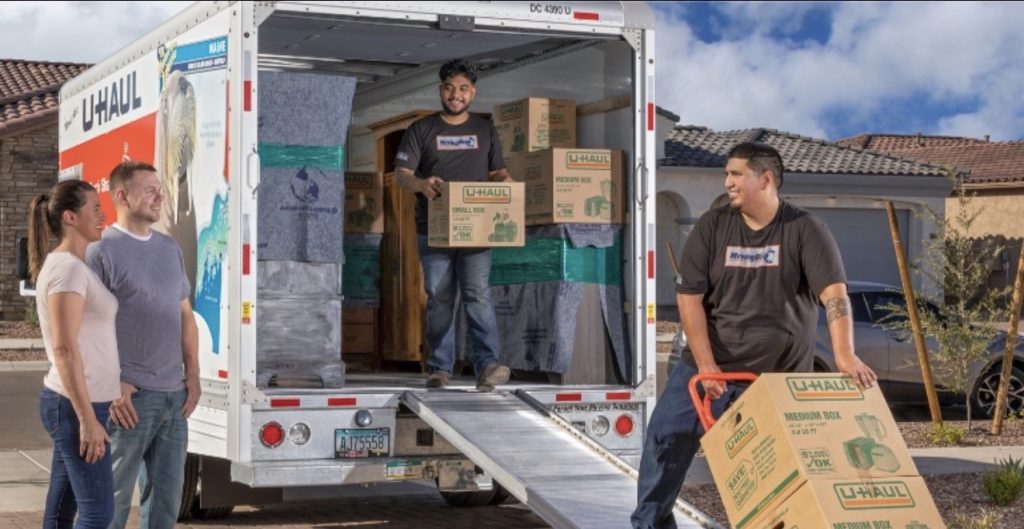movers delivering furniture to new home